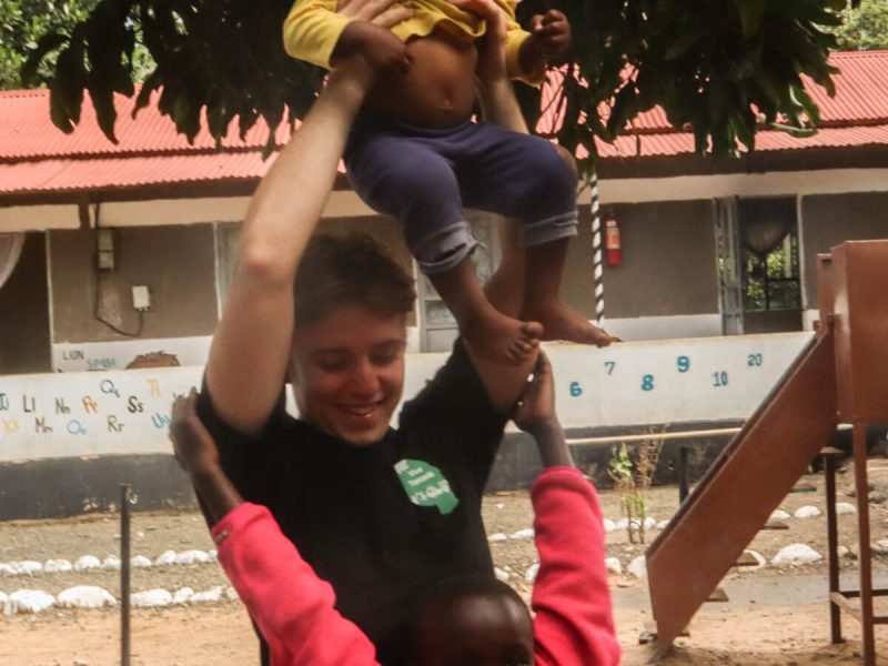 Volunteer with disabled children in Tanzania